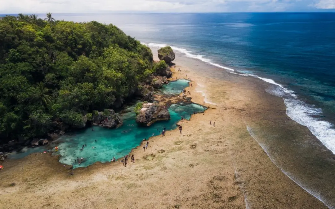 Aerial view of Magpupungko natural tidal rock pools at low tide