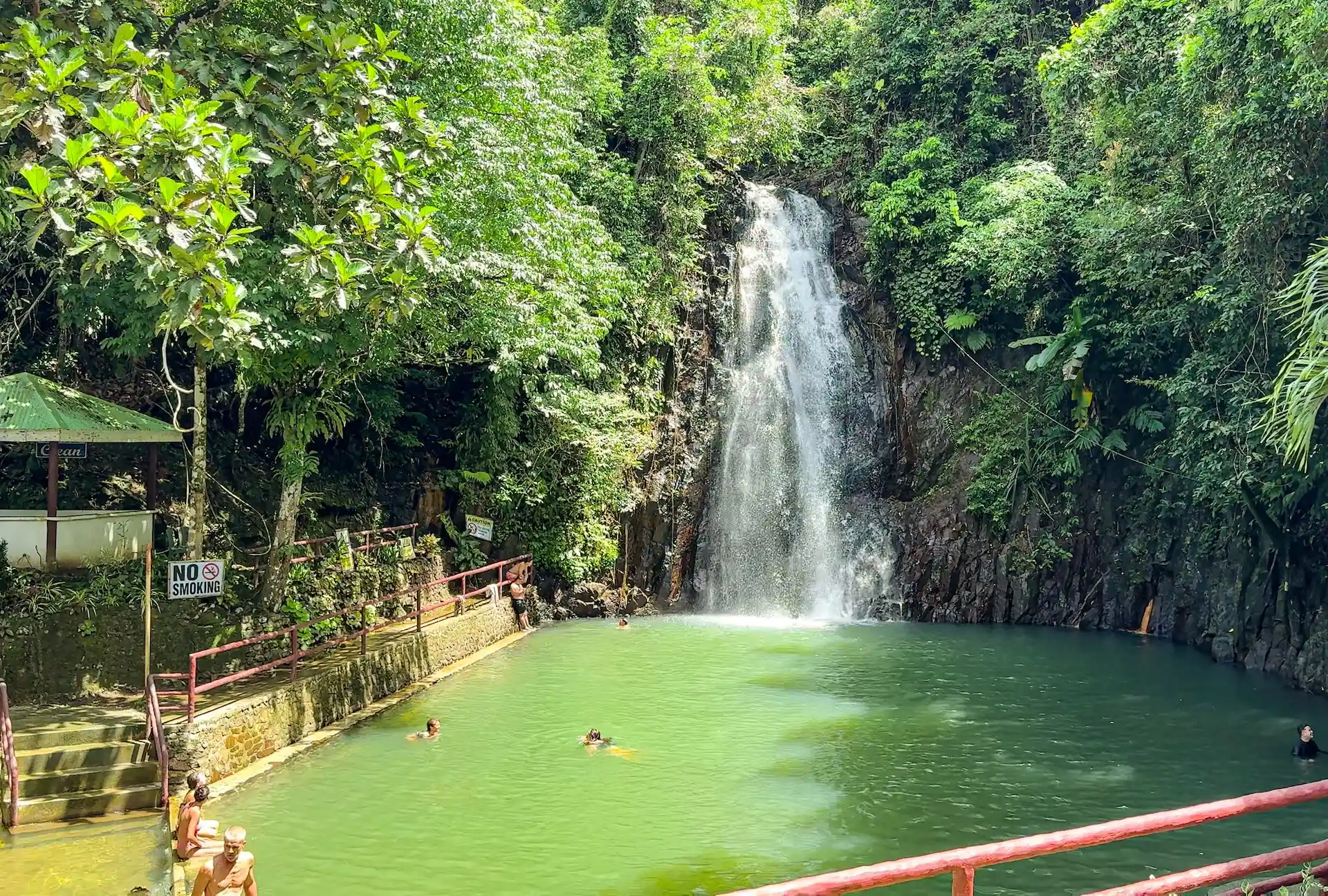 Panoramic view of Taktak Falls cascading through the jungle in North Siargao
