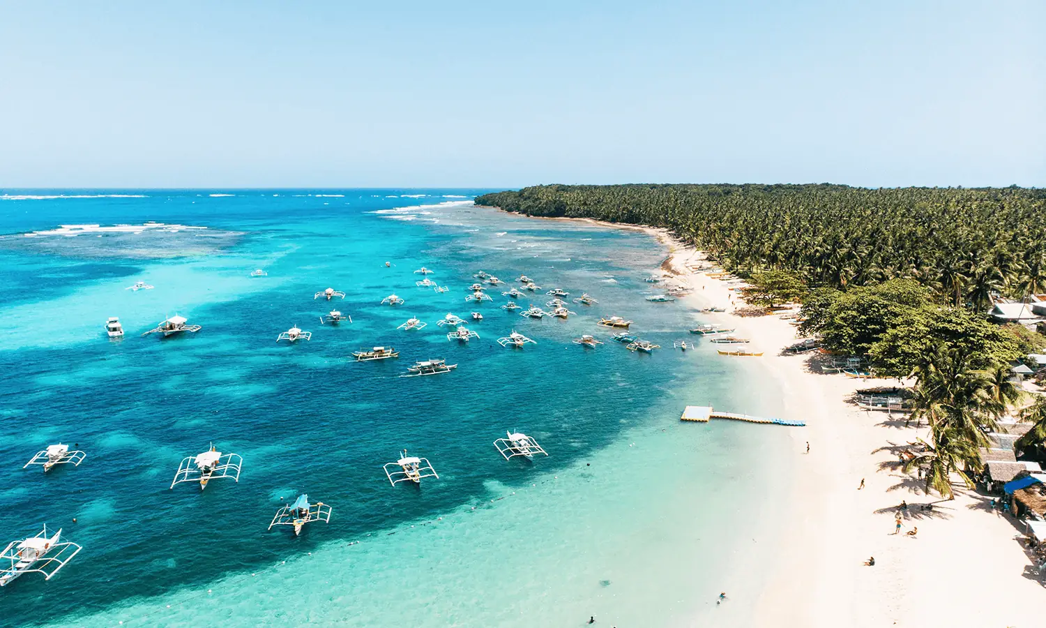 White sand beach on Daku Island, part of the Siargao Tri-Island Tour