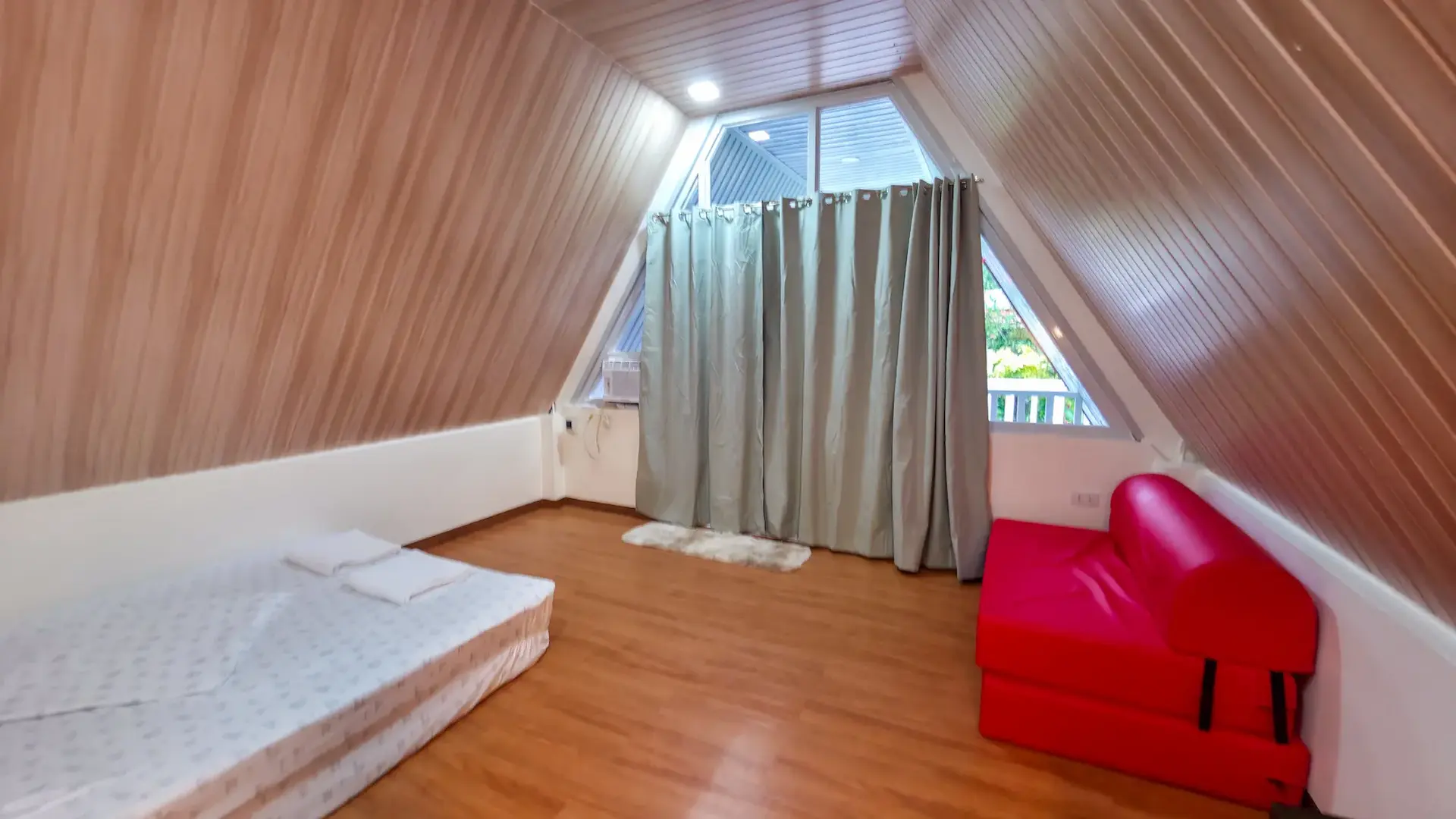 Twin A-Frame Room interior — wooden ceiling and open layout at Mariden Resort Siargao