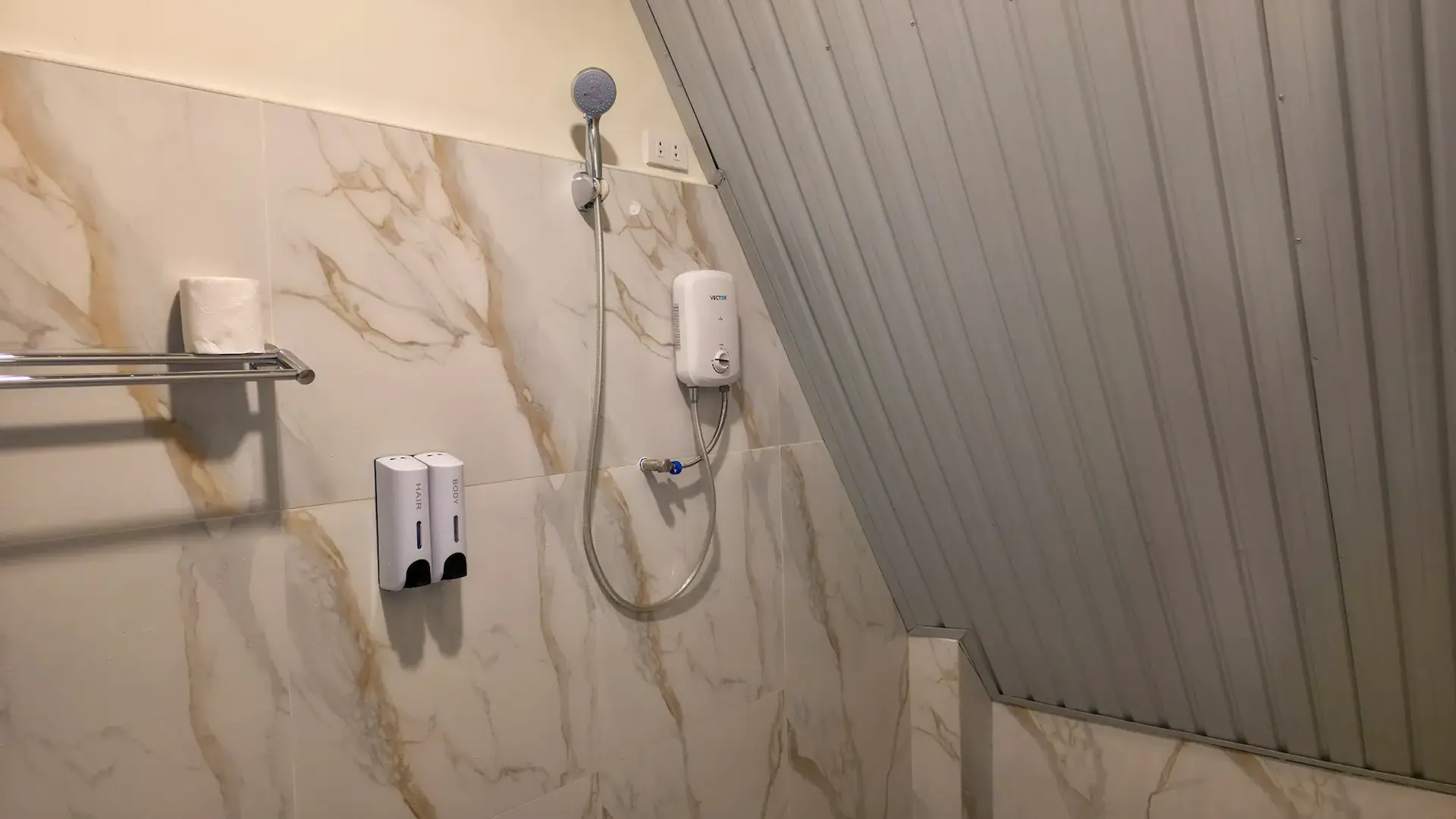 Twin A-Frame Room private bathroom with hot and cold shower