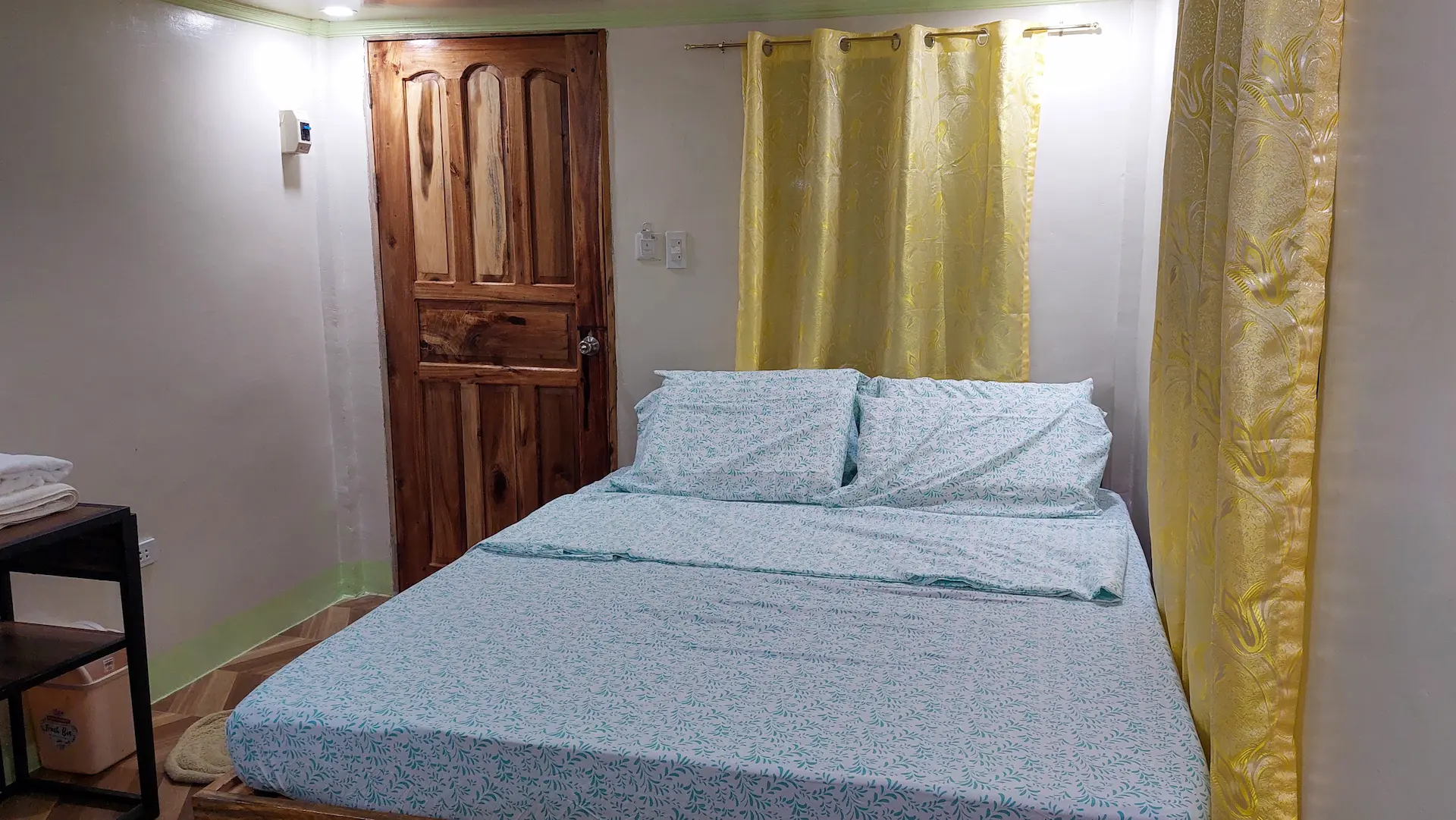 Cozy Double Room headboard and bedside lighting