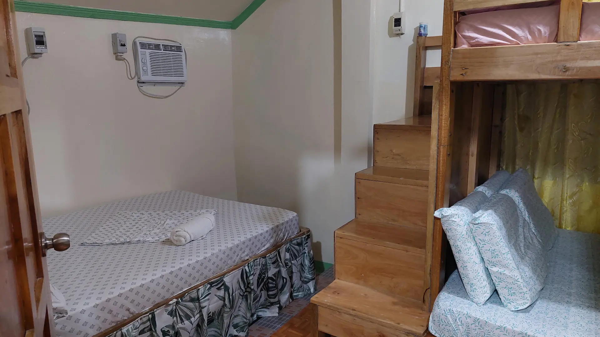 Snug Family Room at Mariden Resort Del Carmen Siargao near airport - standalone cabin for 6 guests (up to 8 with extra beds) with kitchen and living area