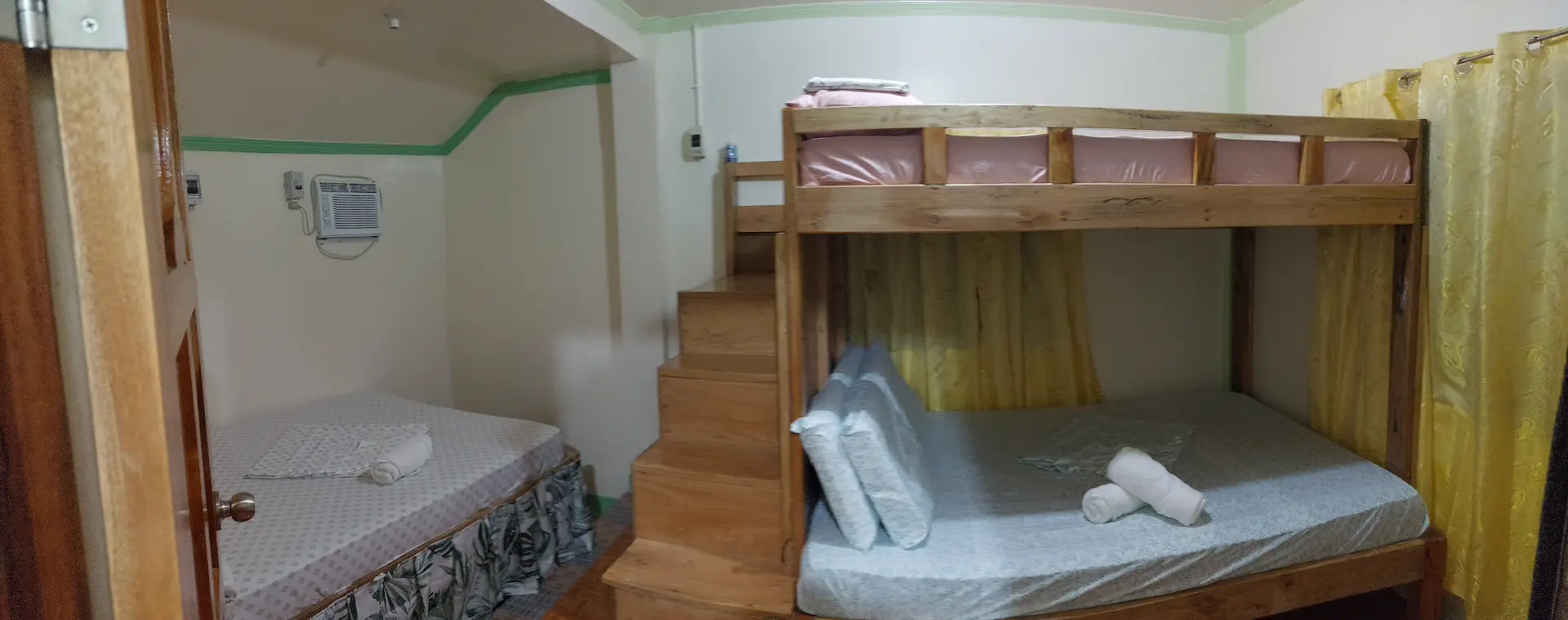 Snug Family Room open layout with living area and double bed